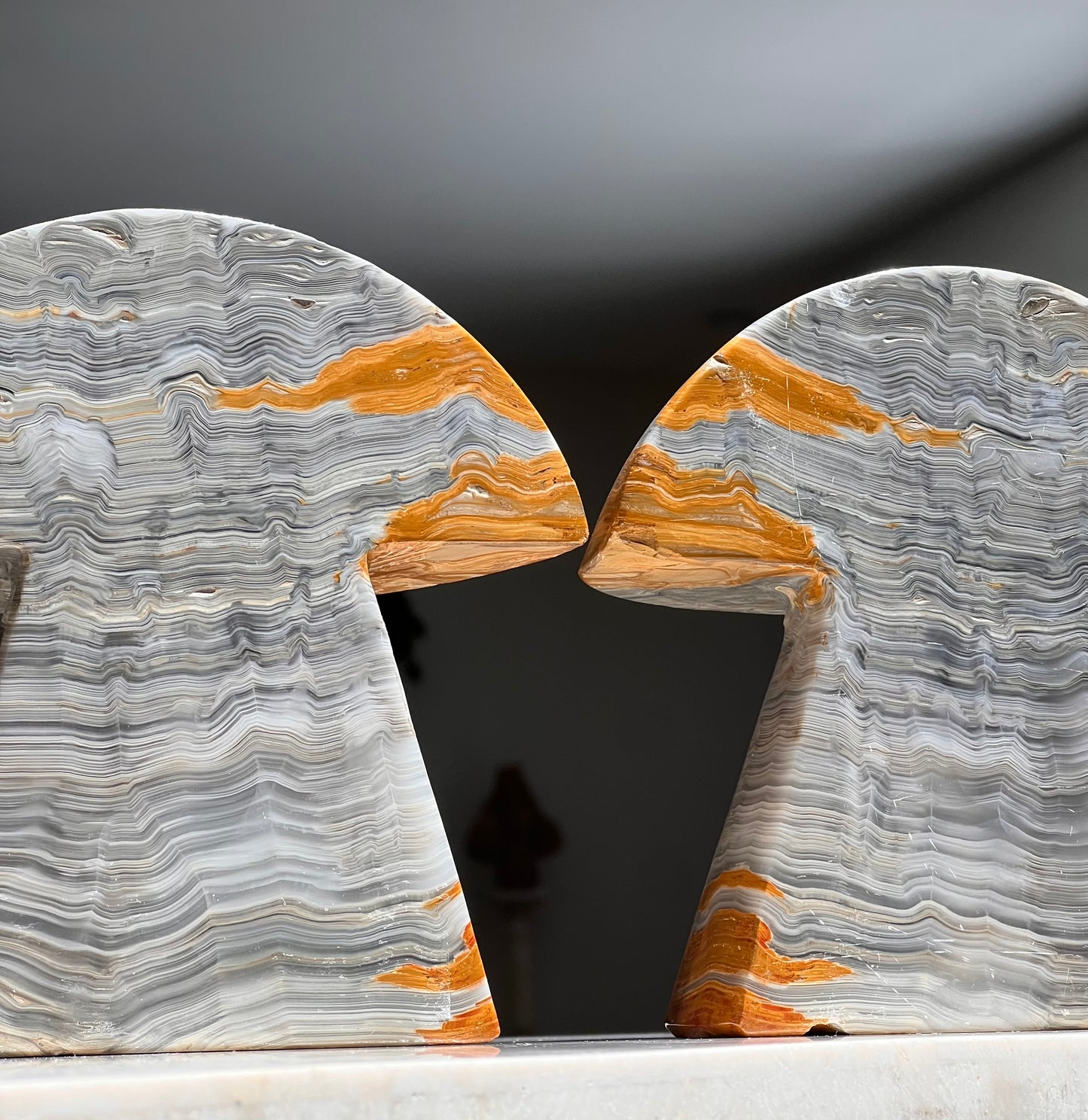 Pair of onyx mushroom bookends, late 20th century