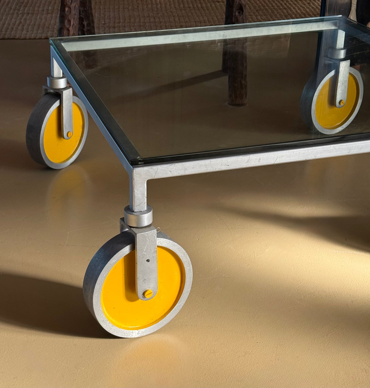 Glass coffee table on wheels after Gae Aulenti, 20th century