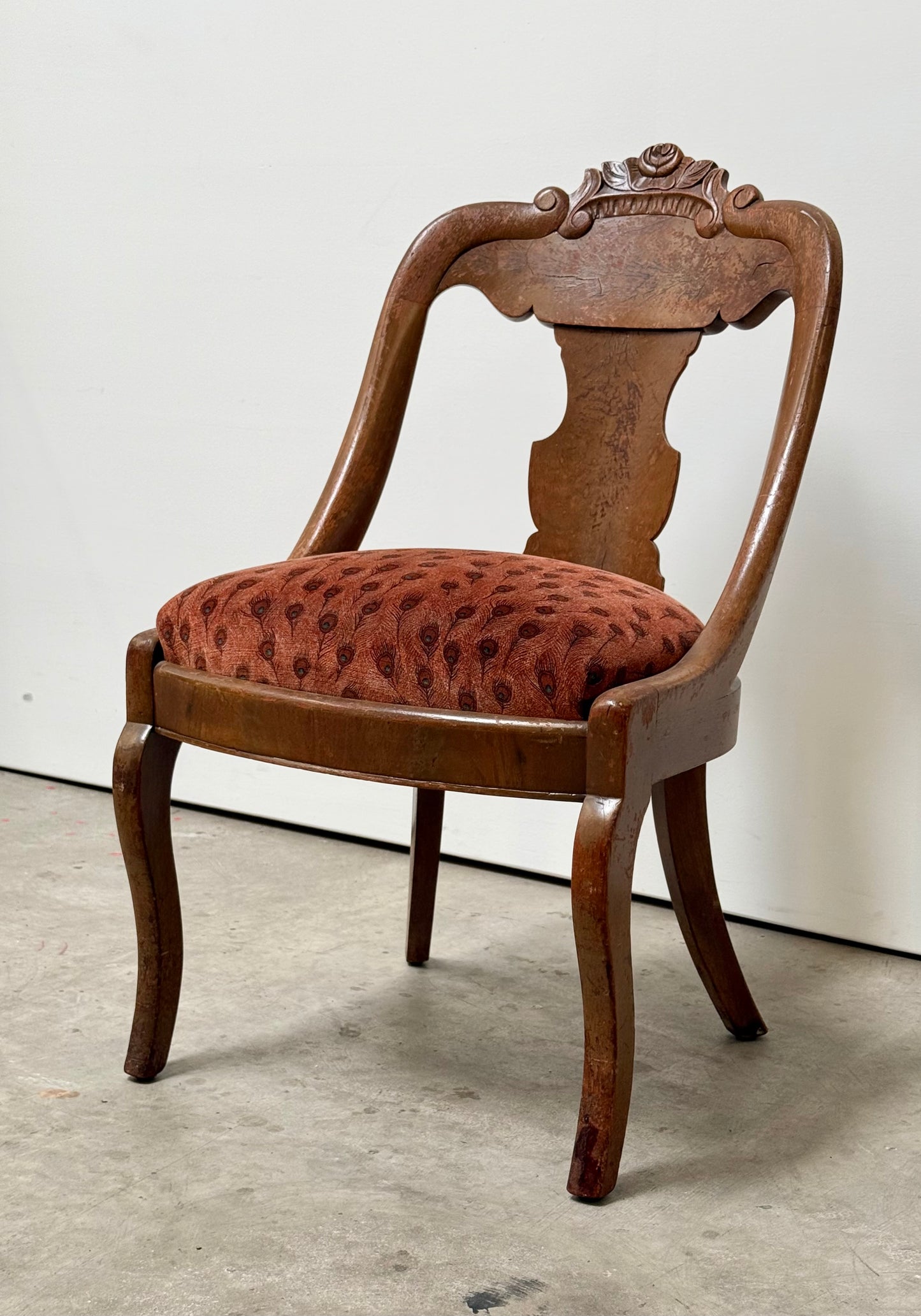 Antique Victorian bergère chair with peacock upholstery, circa 1900