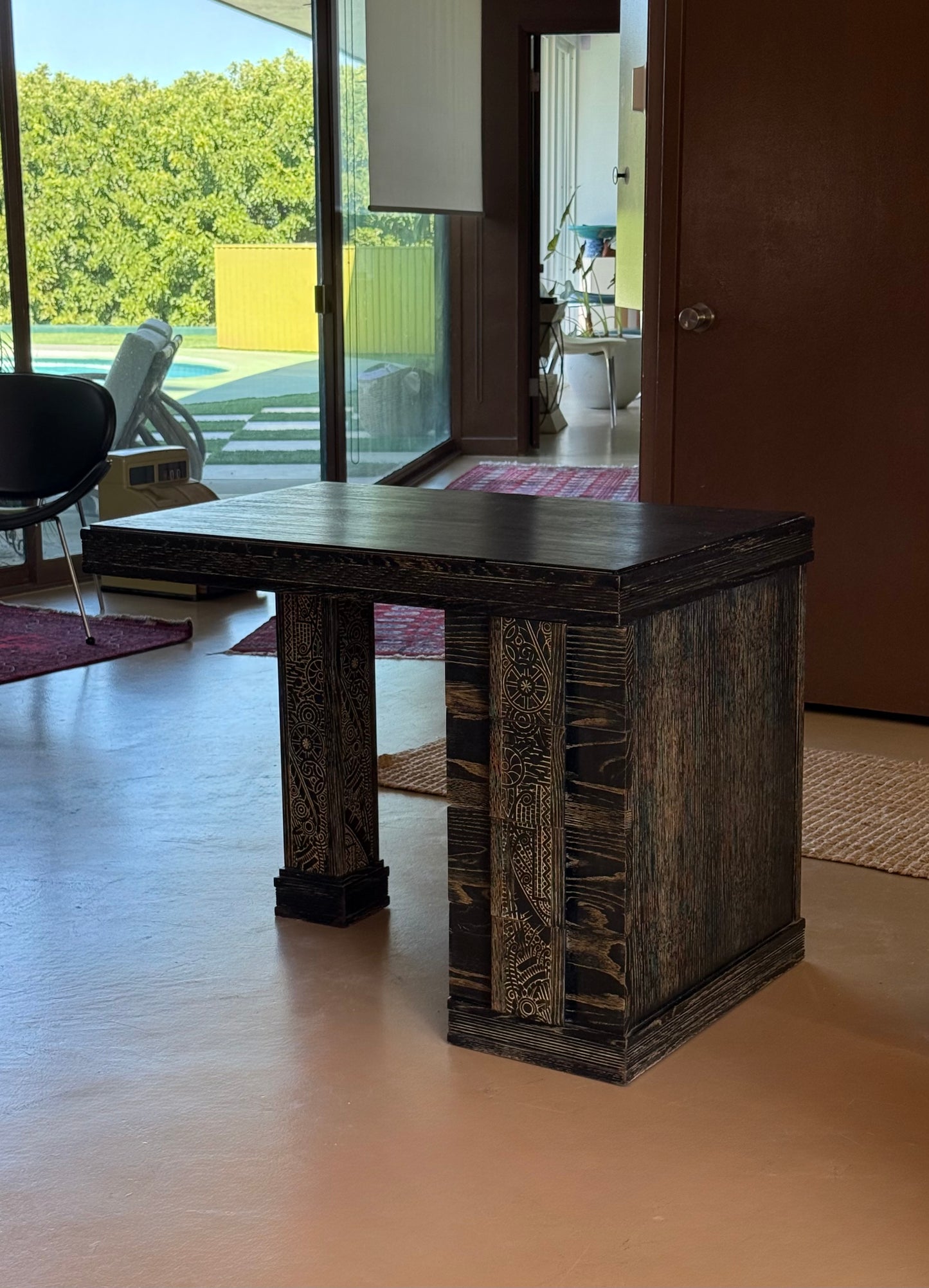 Hand-carved ebonized wood desk, early 20th century