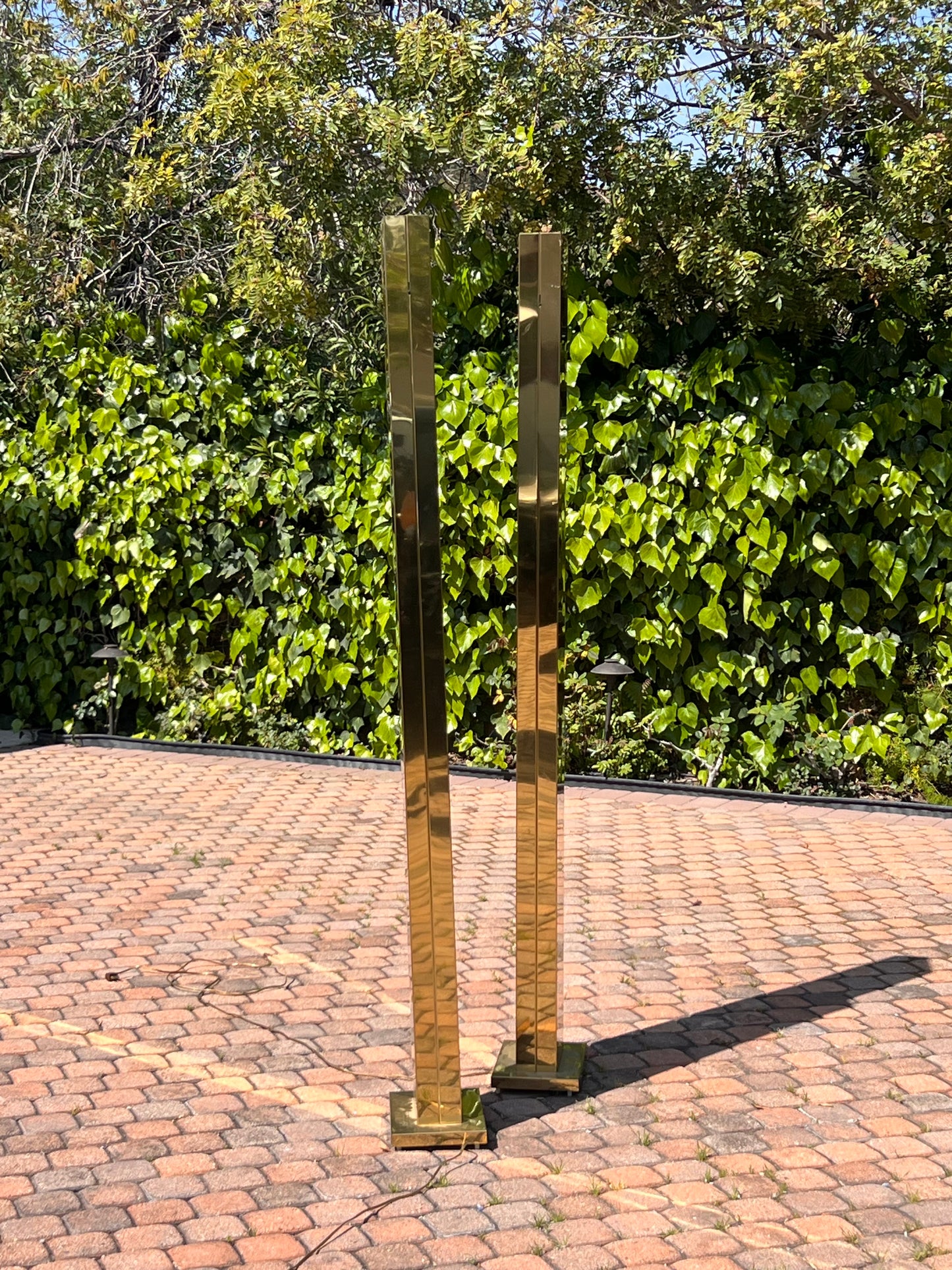 Pair of monolith brass “Pylon” torchiere floor lamps by Casella, circa 1980