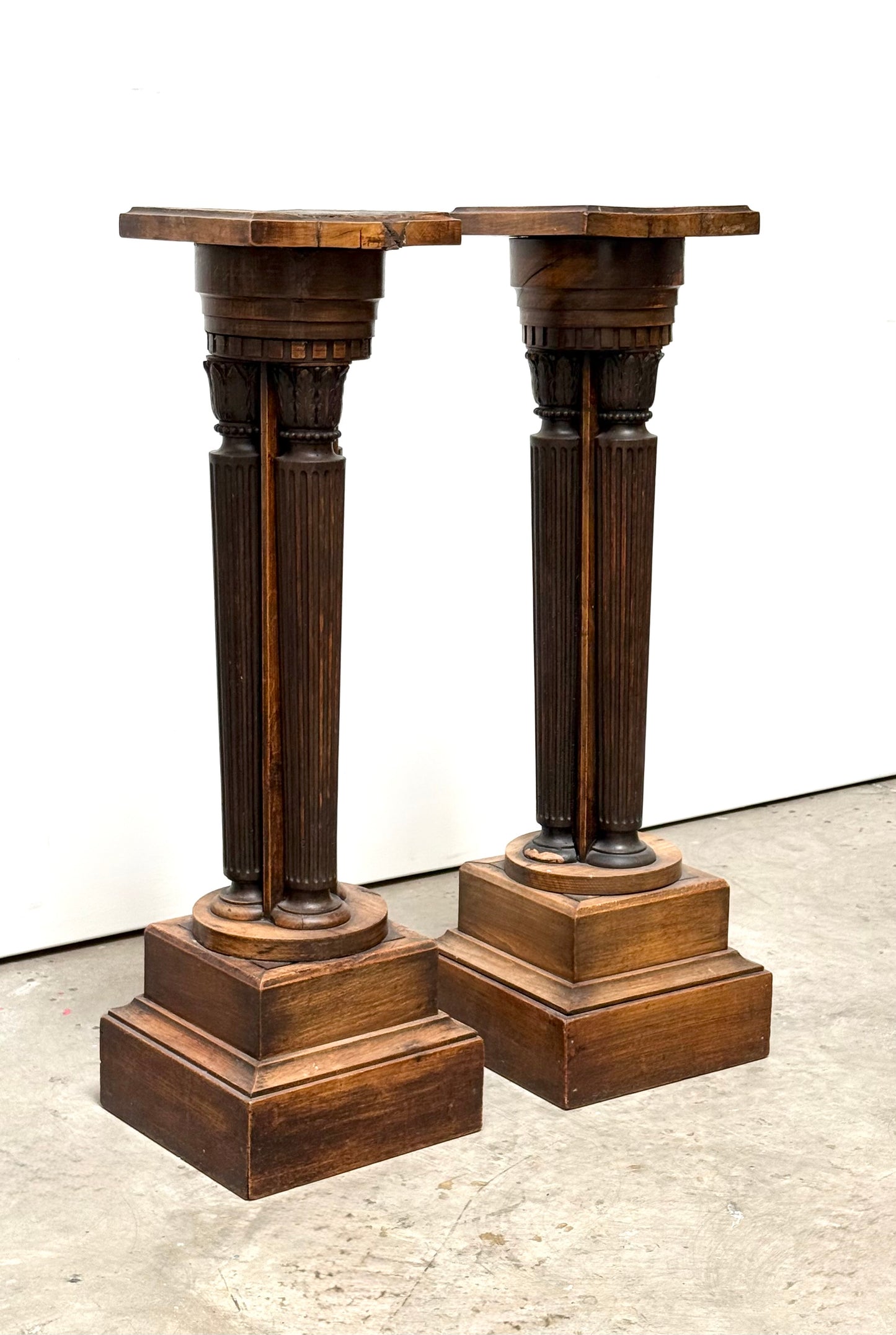 Pair of highly-carved antique French pedestals, 19th century