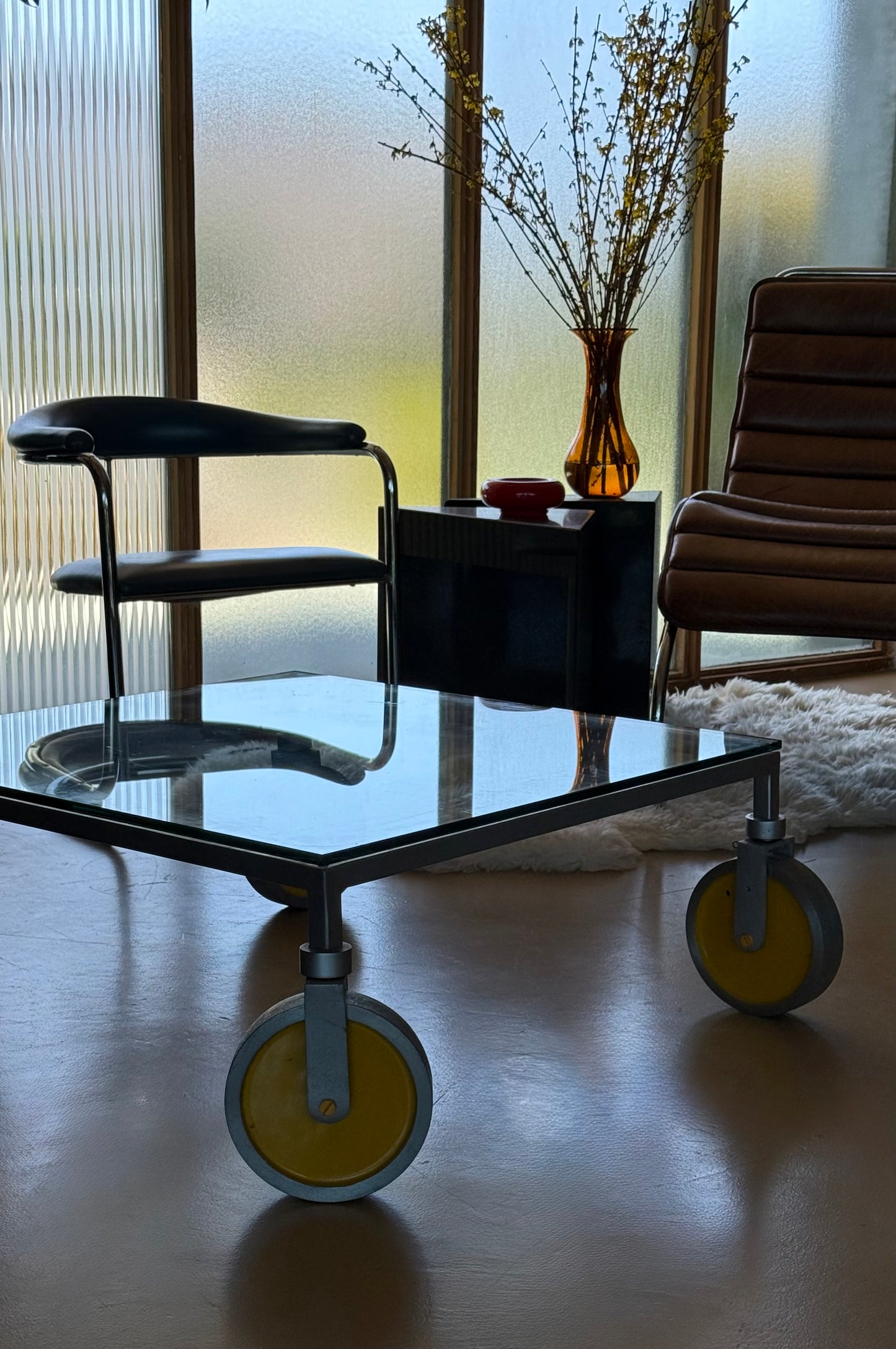 Glass coffee table on wheels after Gae Aulenti, 20th century
