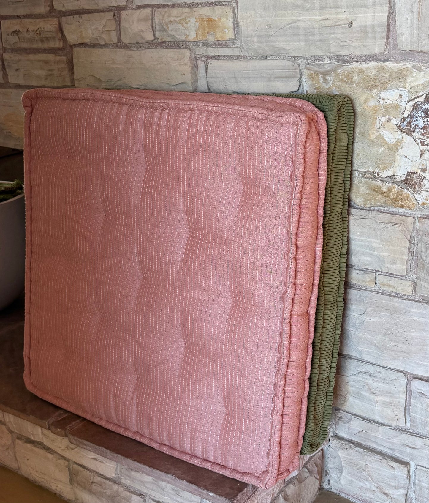 A pair of large floor cushions, 21st century