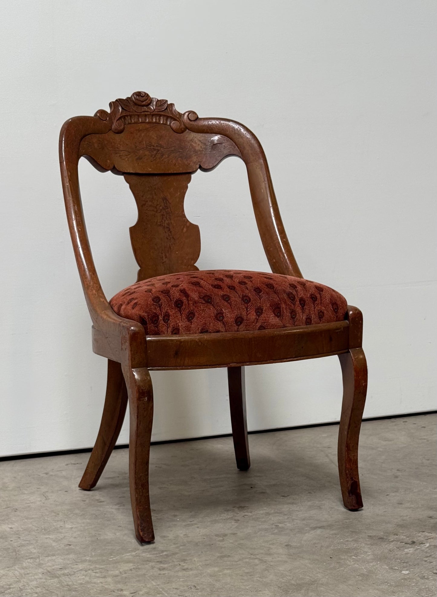 Antique Victorian bergère chair with peacock upholstery, circa 1900