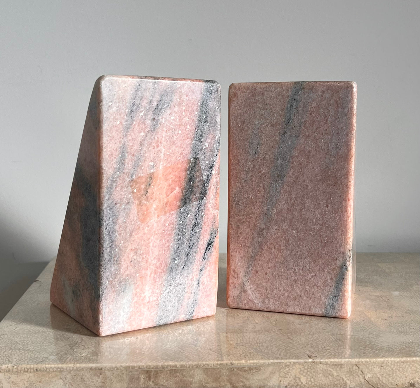 Postmodern pink marble “B” bookends, 20th century