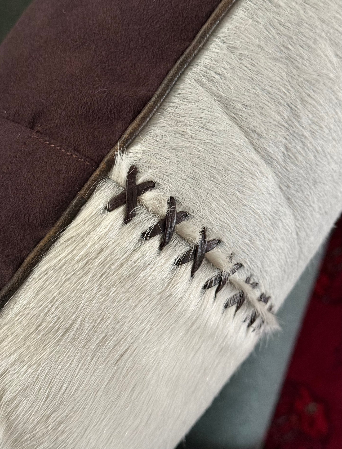 Cowhide and leather throw pillow, 20th century