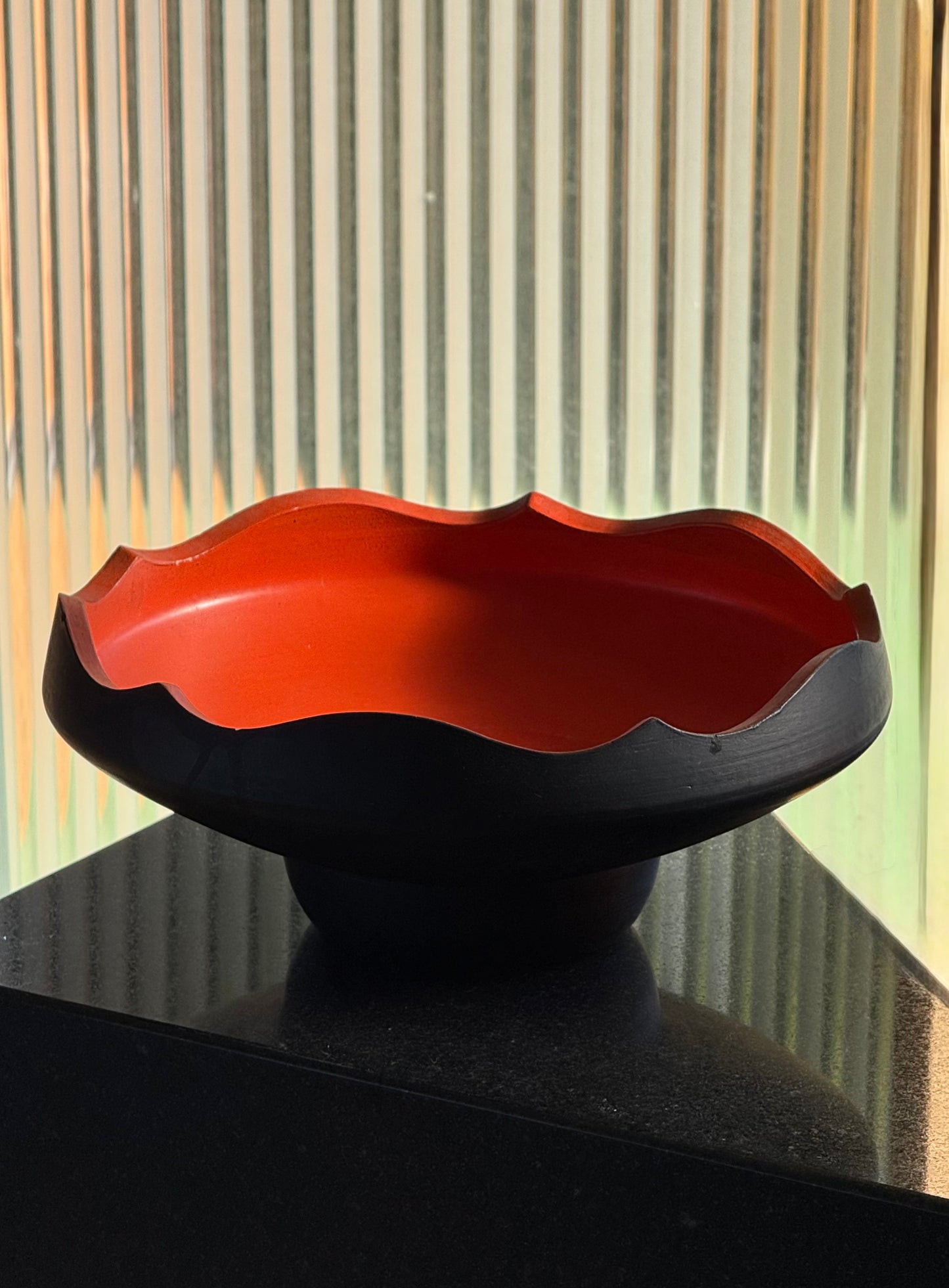 Pedestal bowl with persimmon interior, 20th century