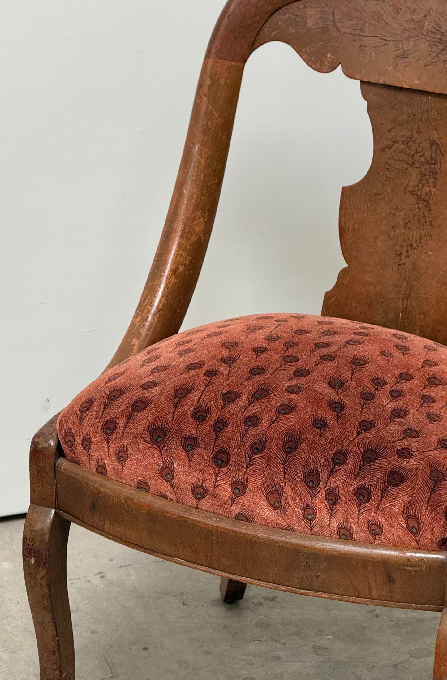 Antique Victorian bergère chair with peacock upholstery, circa 1900