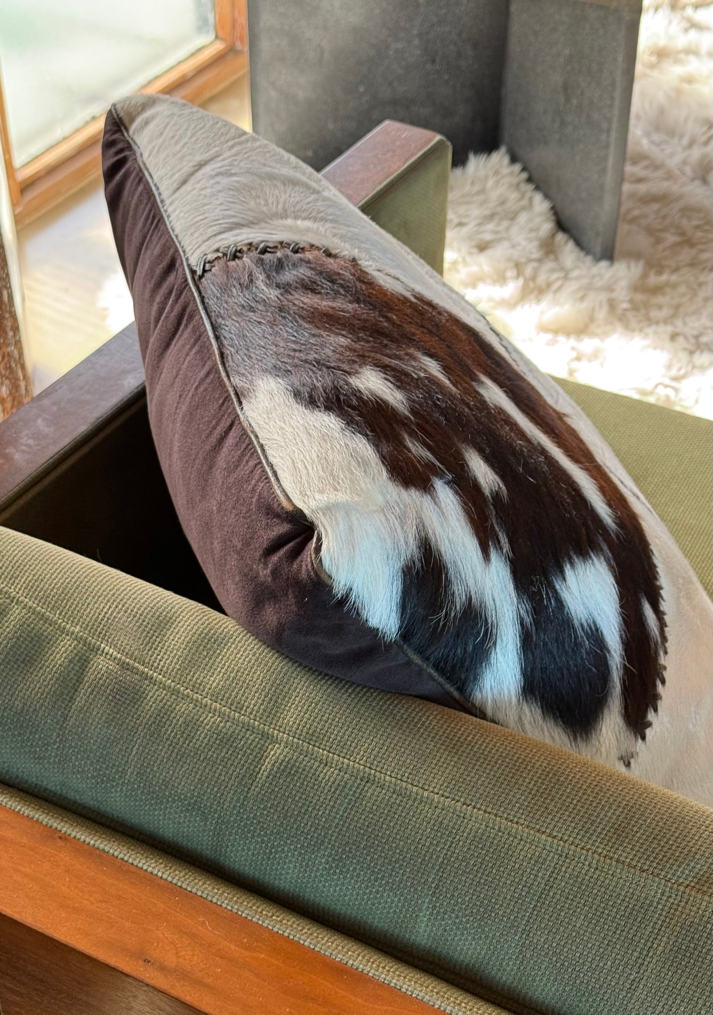 Cowhide and leather throw pillow, 20th century