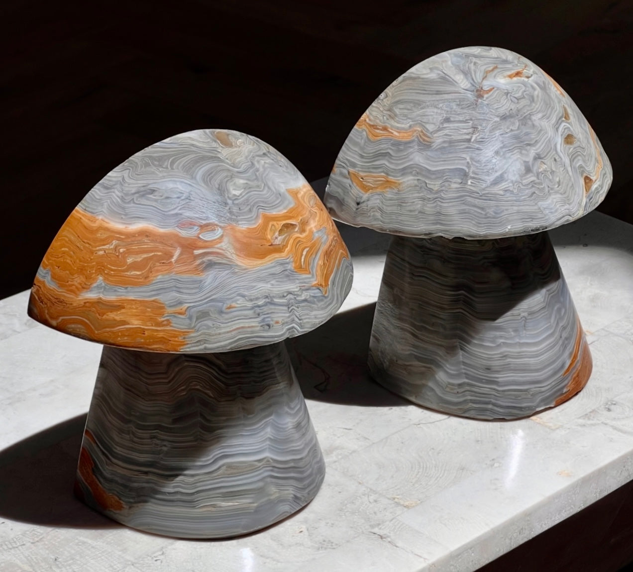 Pair of onyx mushroom bookends, late 20th century
