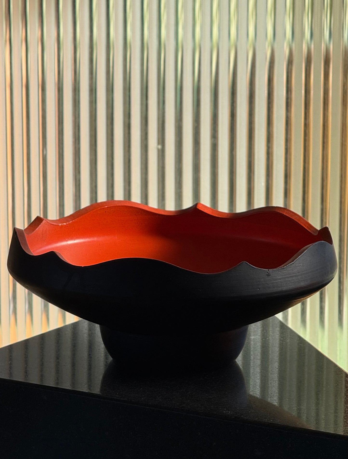 Pedestal bowl with persimmon interior, 20th century