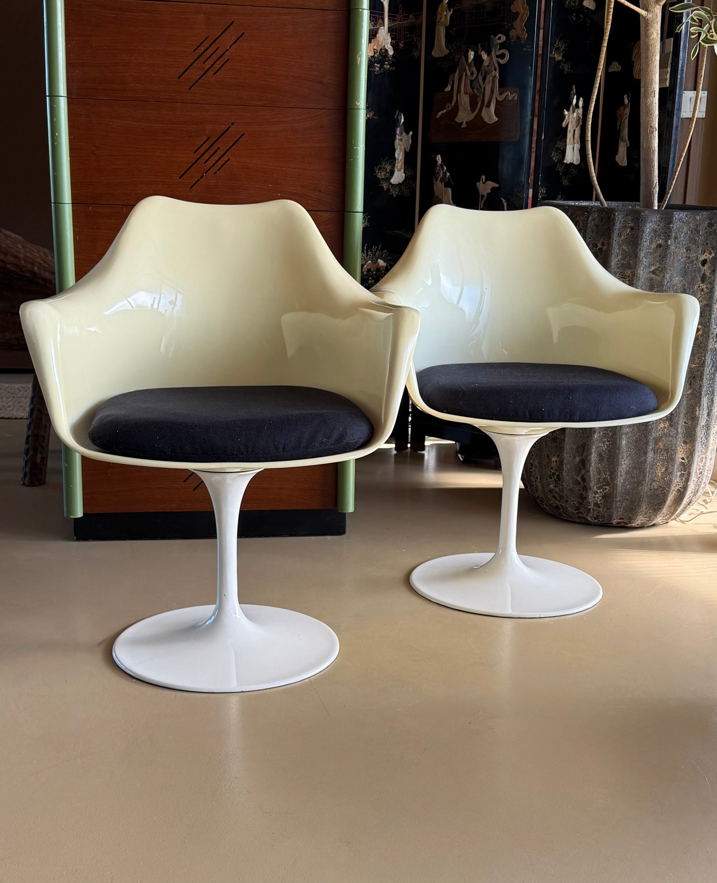 Pair of swivel tulip chairs by Eero Saarinen for Knoll, circa 1955