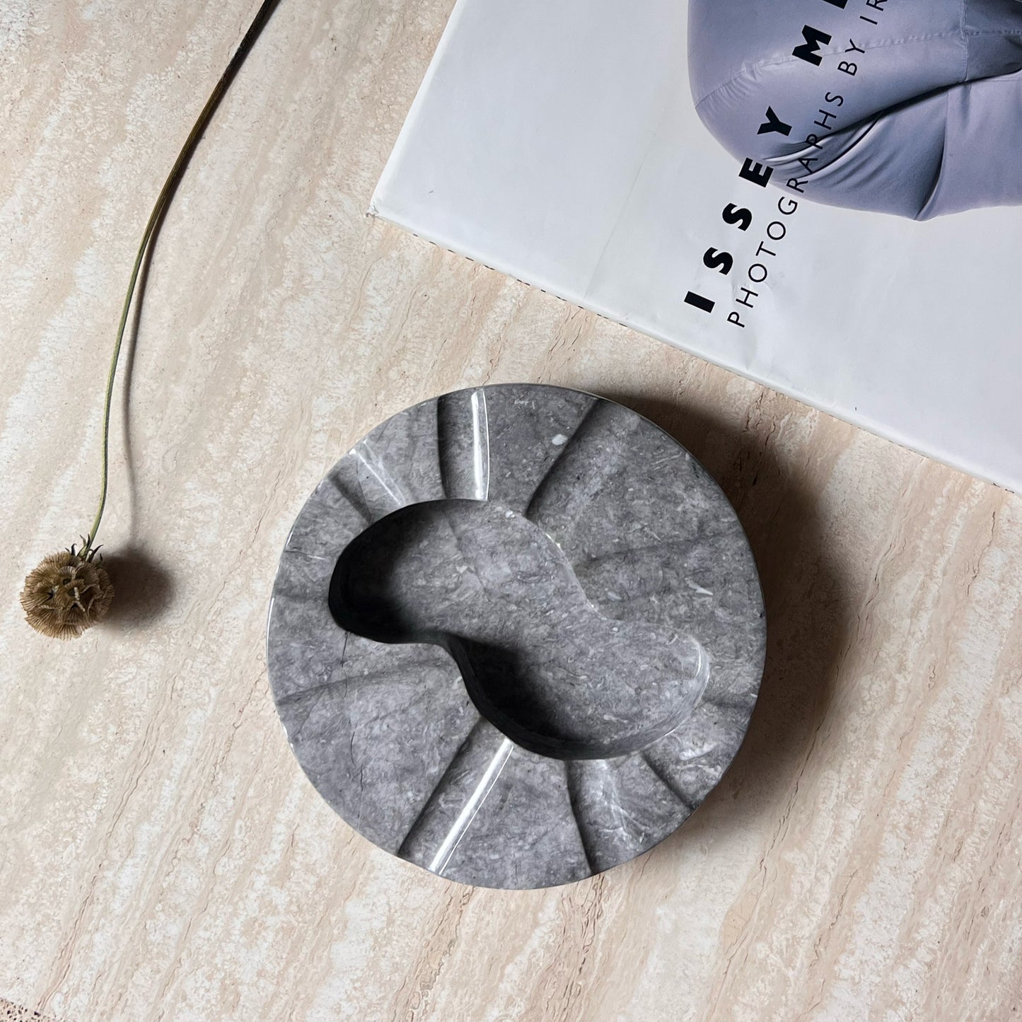 Monumental Italian granite ashtray with biomorphic carving, circa 1970