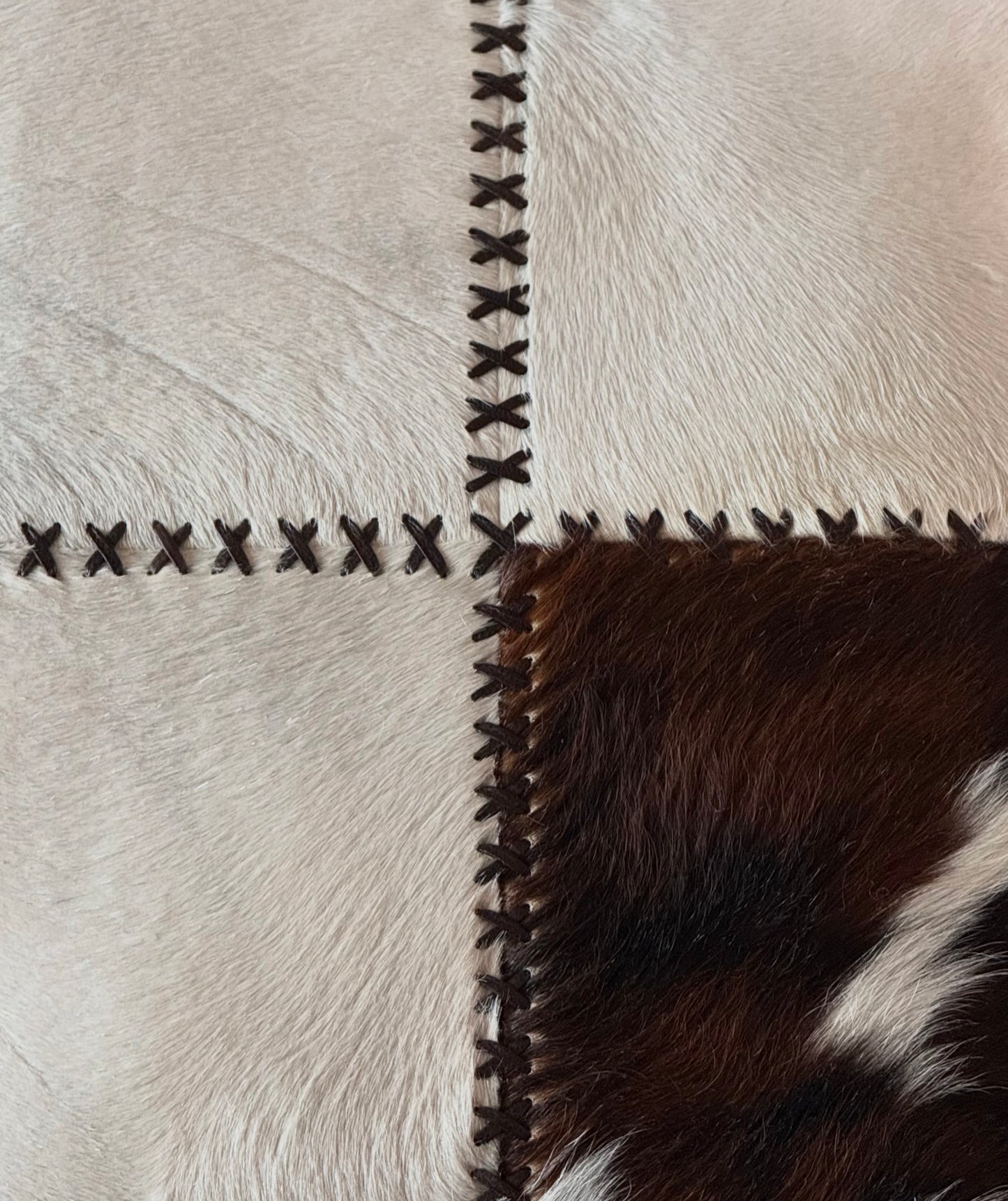 Cowhide and leather throw pillow, 20th century