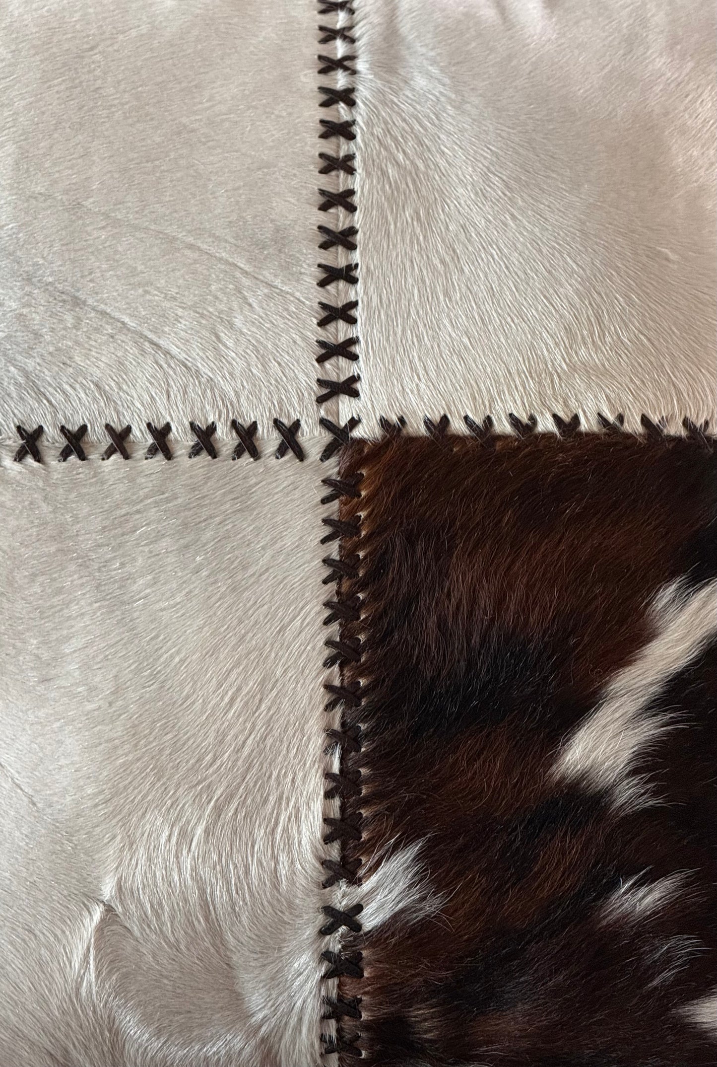 Cowhide and leather throw pillow, 20th century