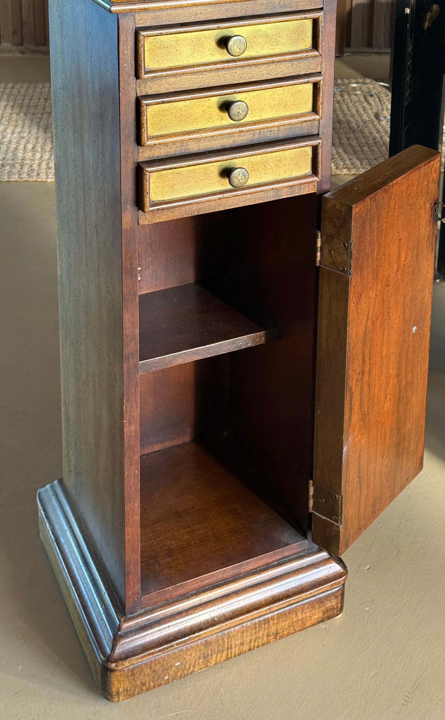 Wood and brass pedestal cabinet with pocket drawers, late 19th century