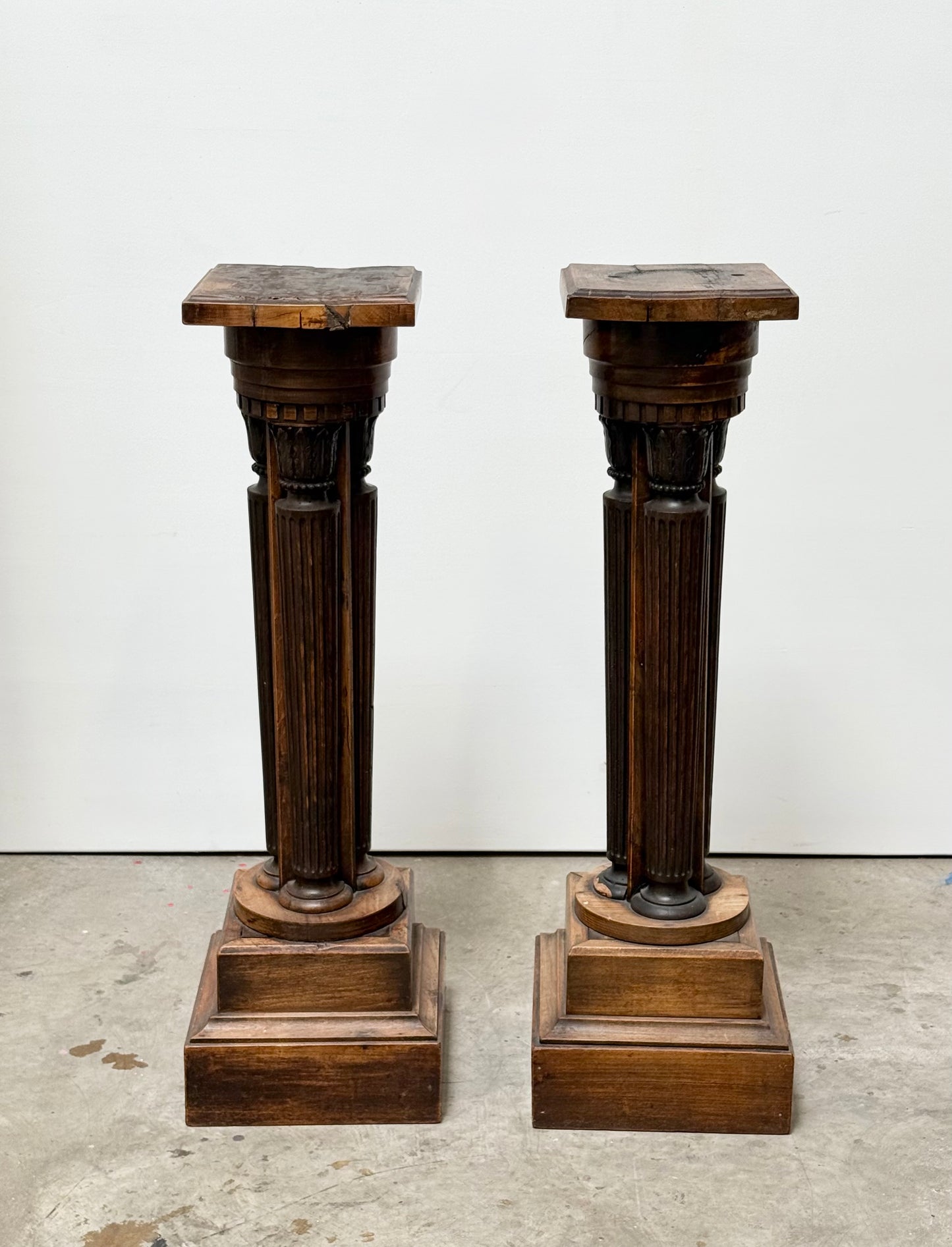 Pair of highly-carved antique French pedestals, 19th century