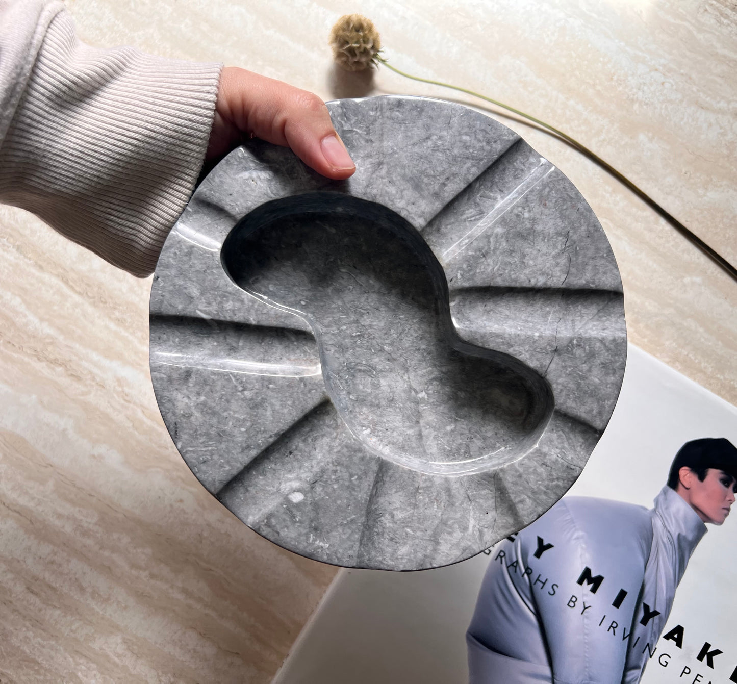 Monumental Italian granite ashtray with biomorphic carving, circa 1970