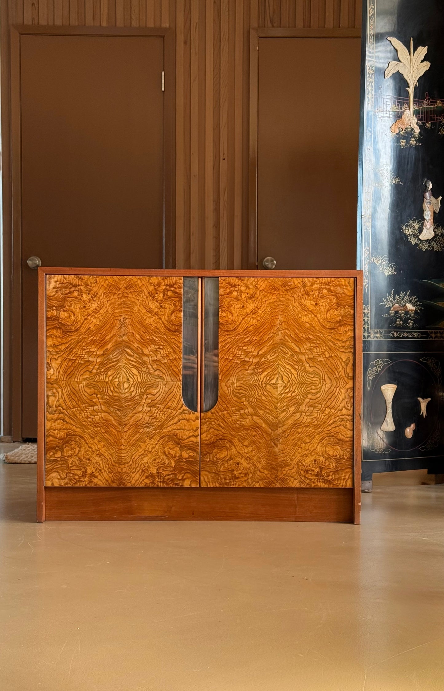 Burl and chrome cabinet by Milo Baughman, circa 1970