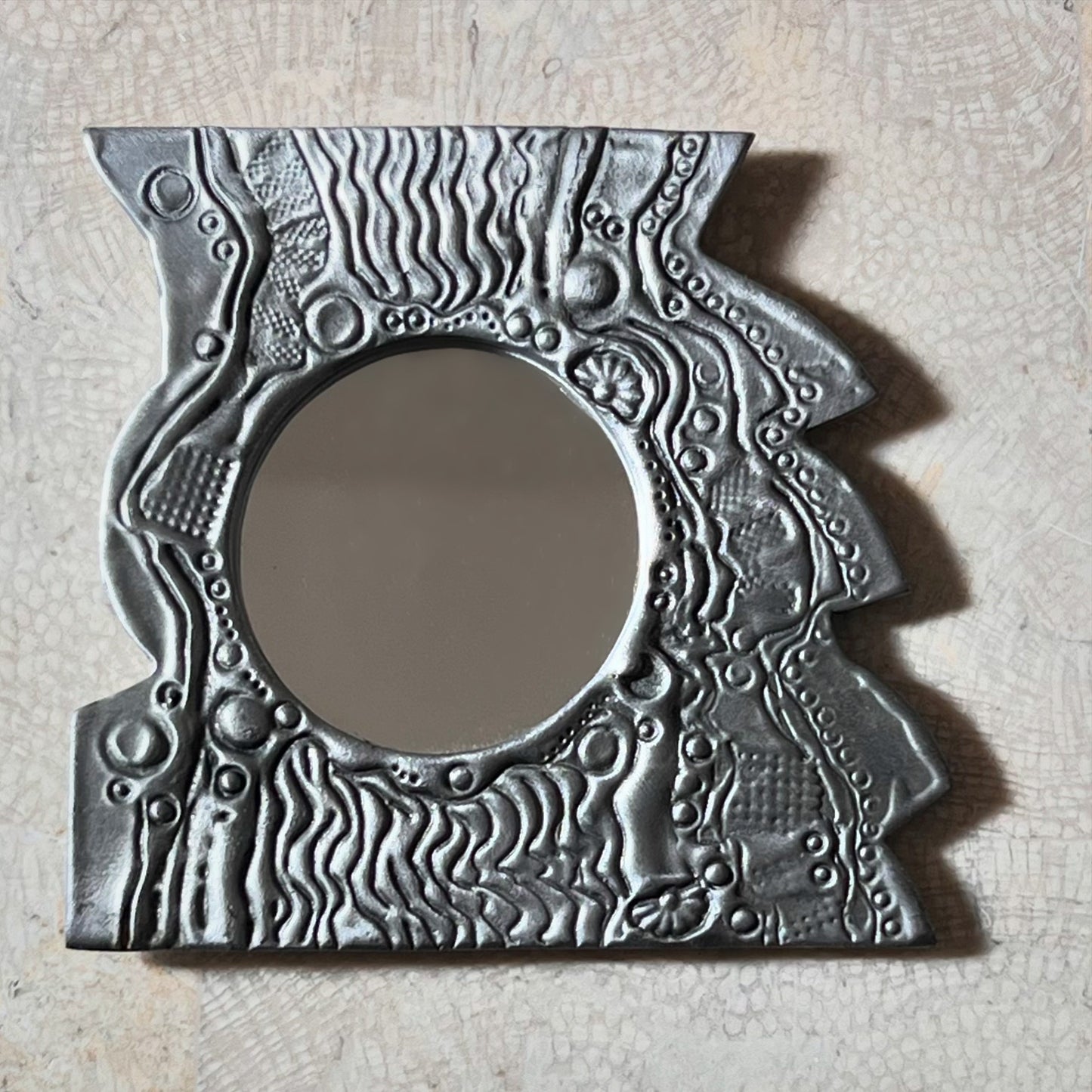 Small pewter mirror by Don Drumm, late 20th century