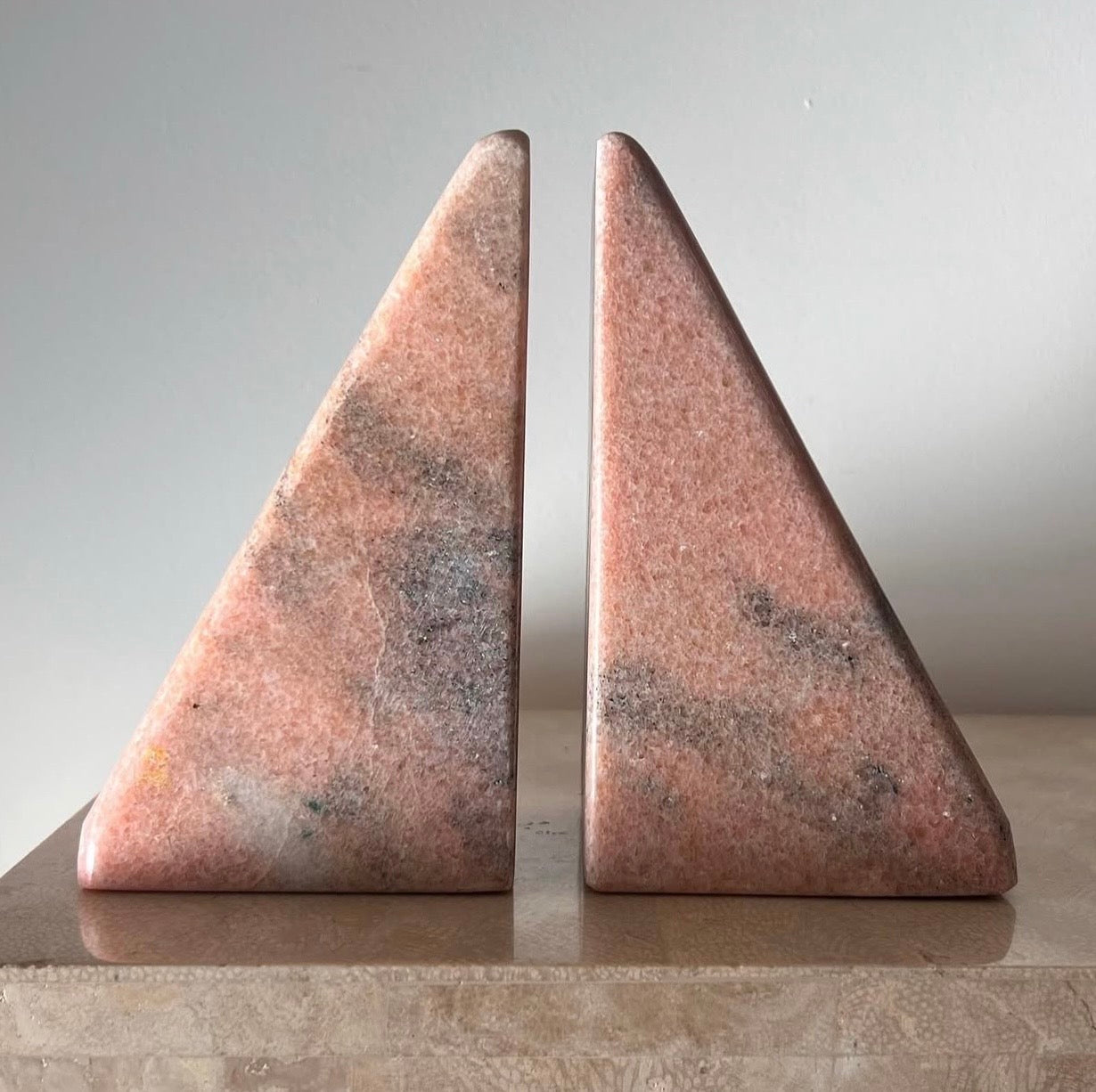 Postmodern pink marble “B” bookends, 20th century