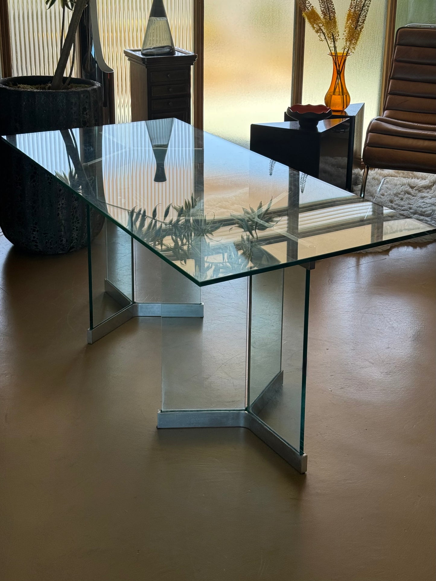 The model 6060 glass and chrome dining table by Irving Rosen for Pace, circa 1970