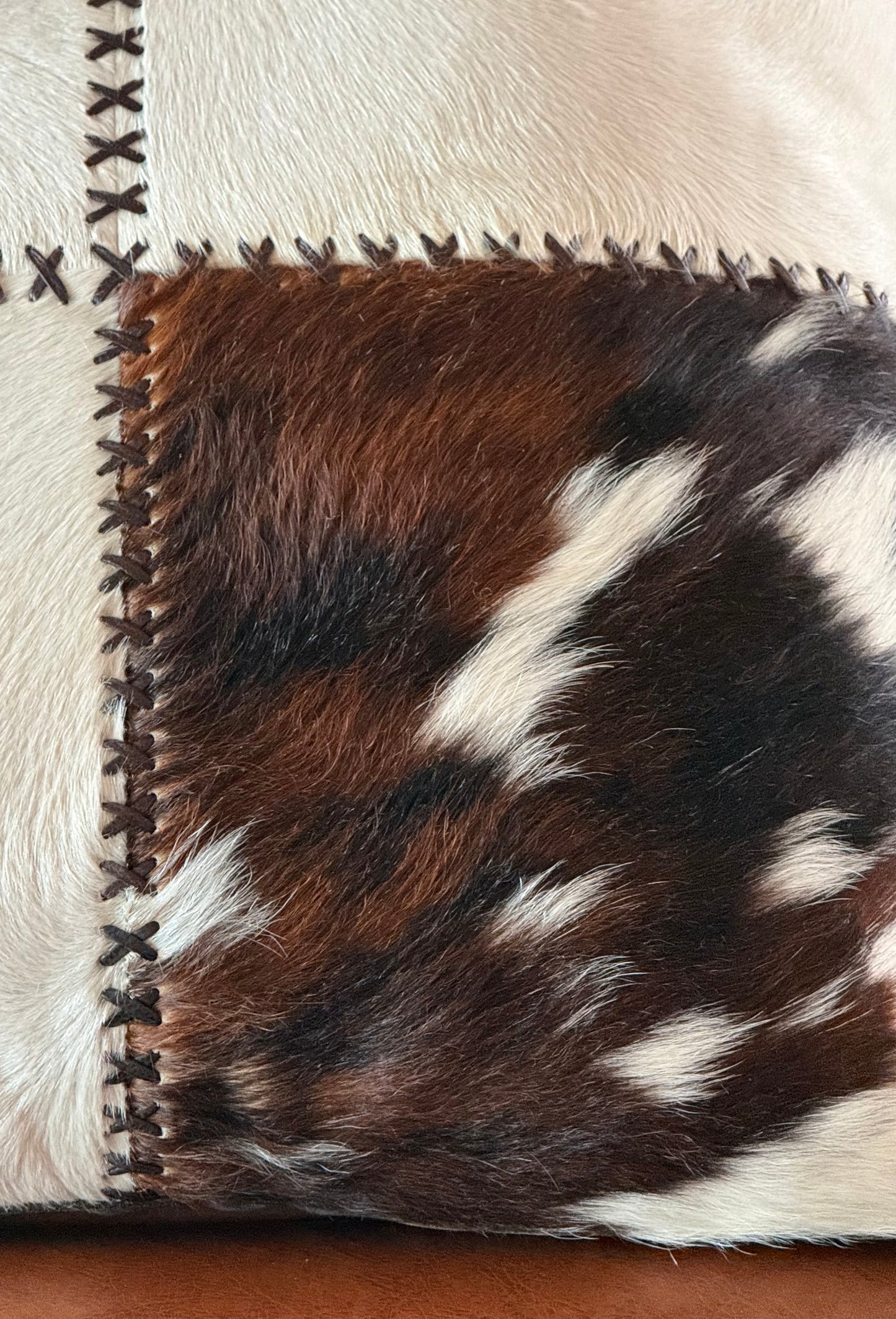 Cowhide and leather throw pillow, 20th century