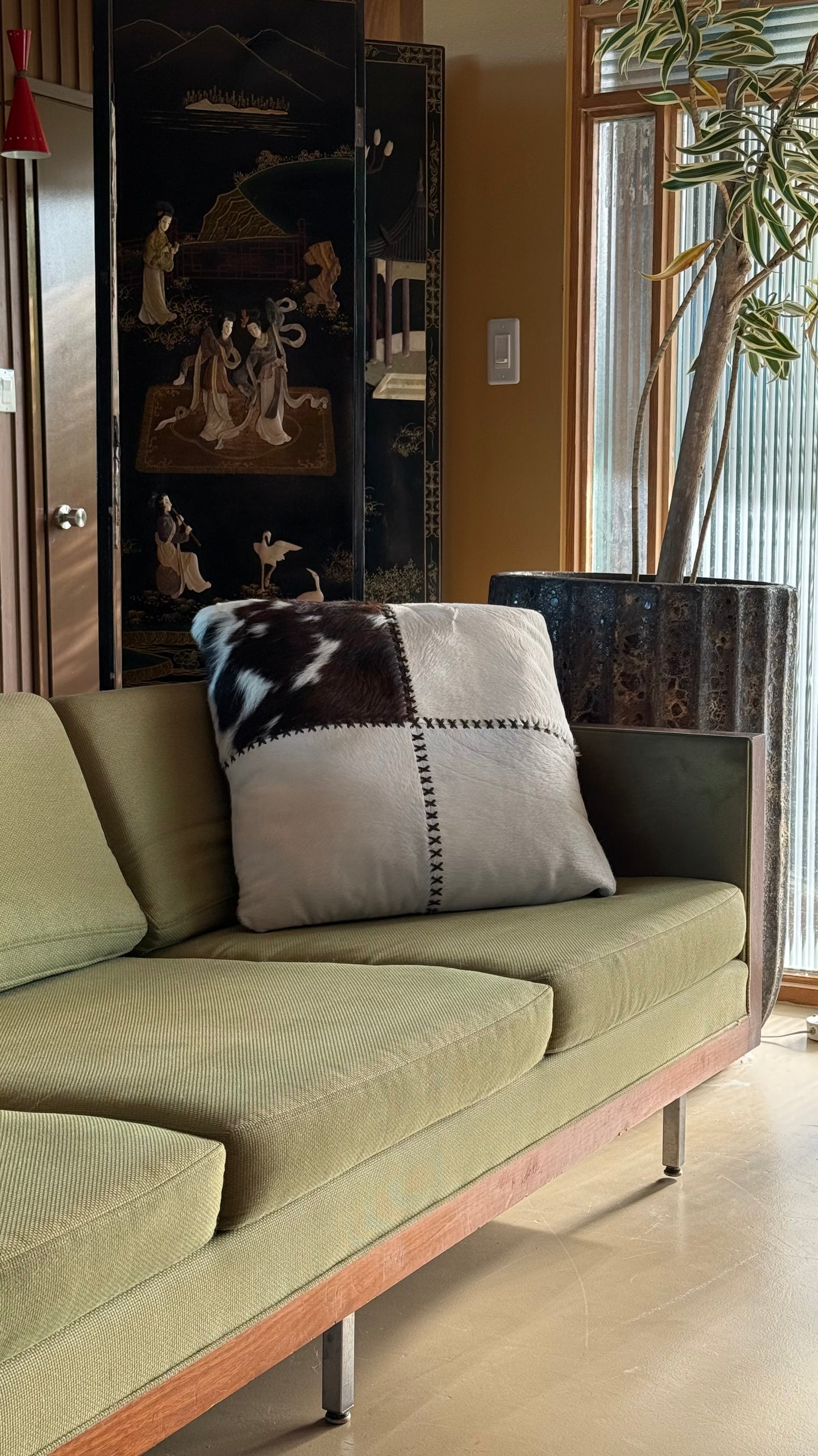 Cowhide and leather throw pillow, 20th century