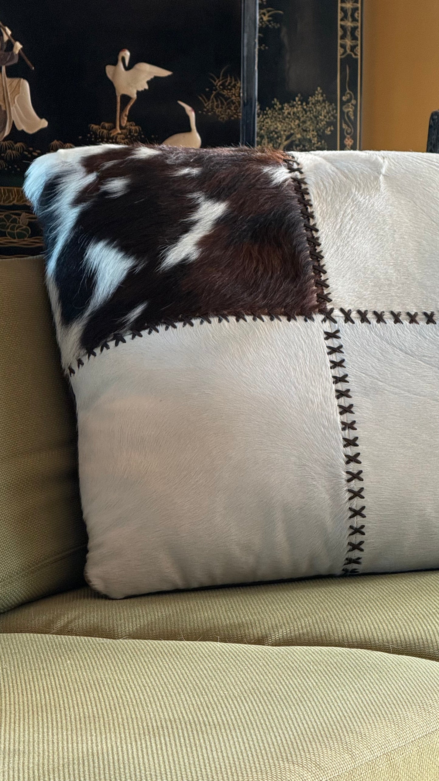 Cowhide and leather throw pillow, 20th century