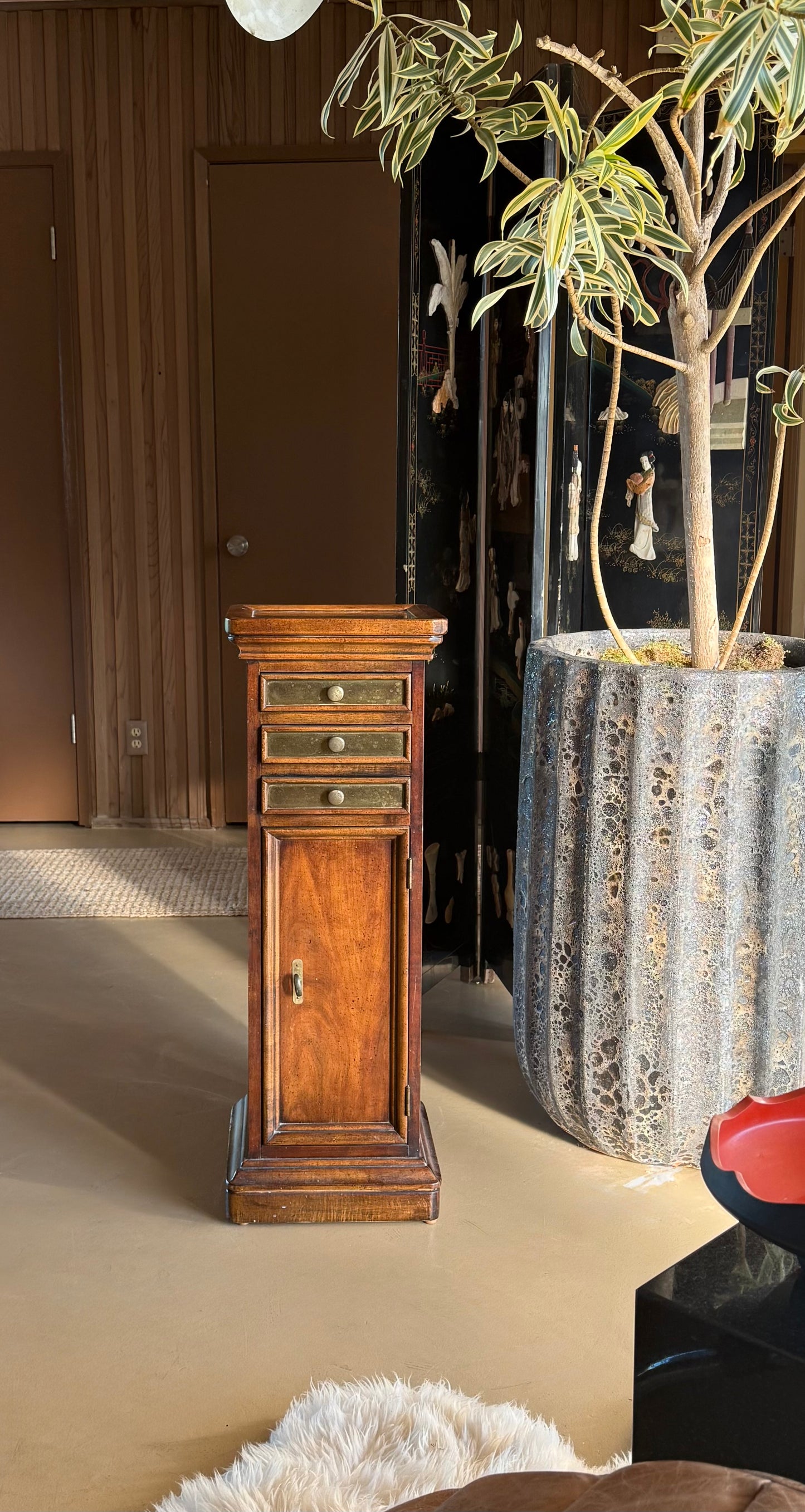 Wood and brass pedestal cabinet with pocket drawers, late 19th century