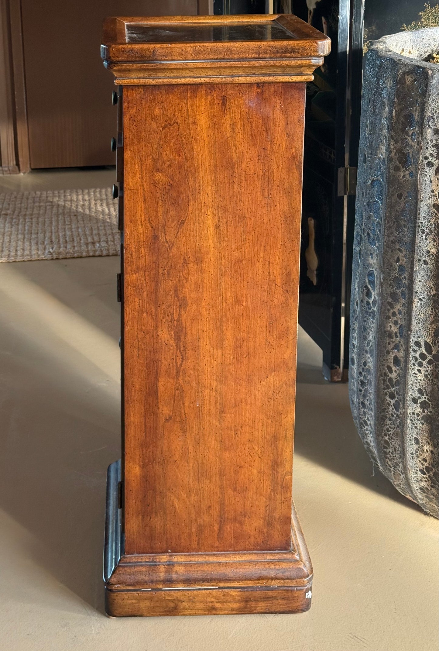 Wood and brass pedestal cabinet with pocket drawers, late 19th century